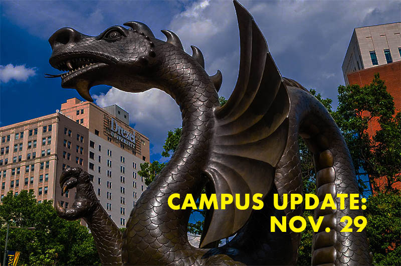 Dragon statue with the words campus update Nov. 29